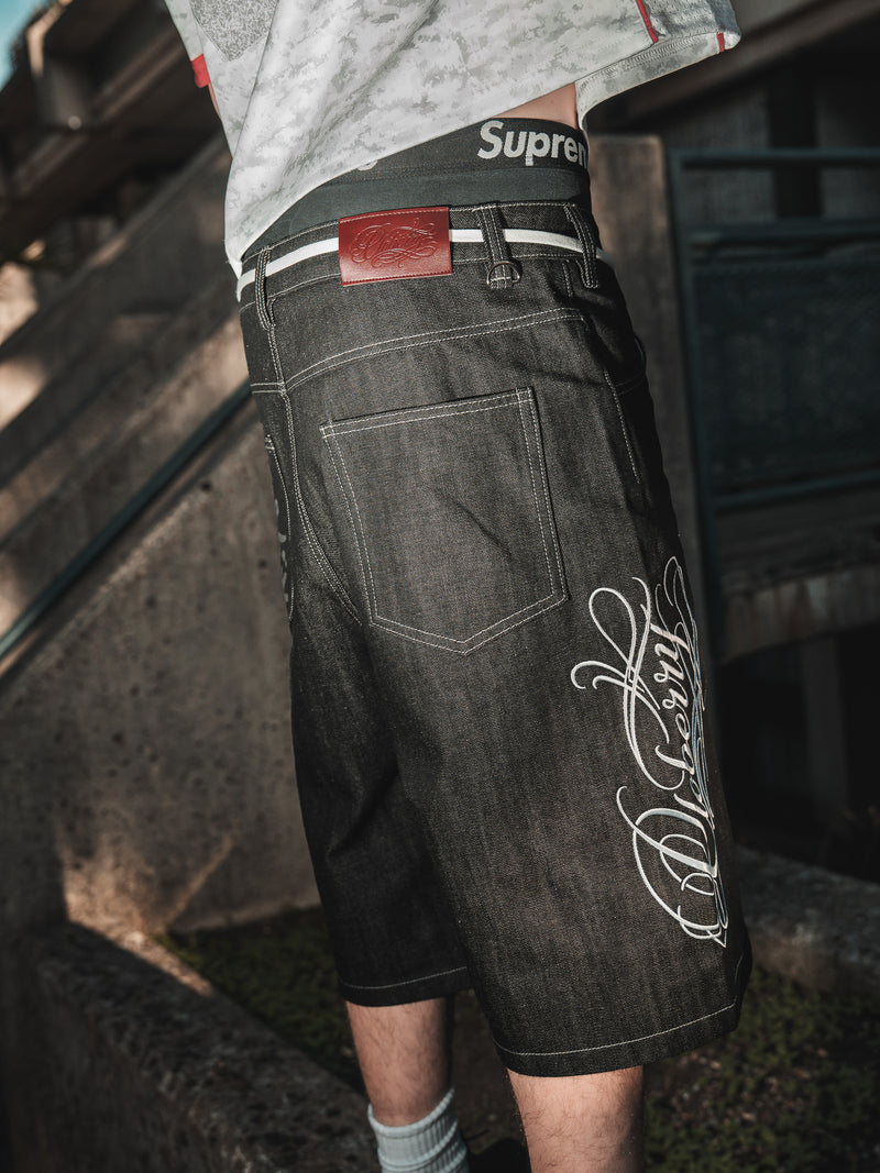 CALIGRAPHY RAW DENIM JORTS